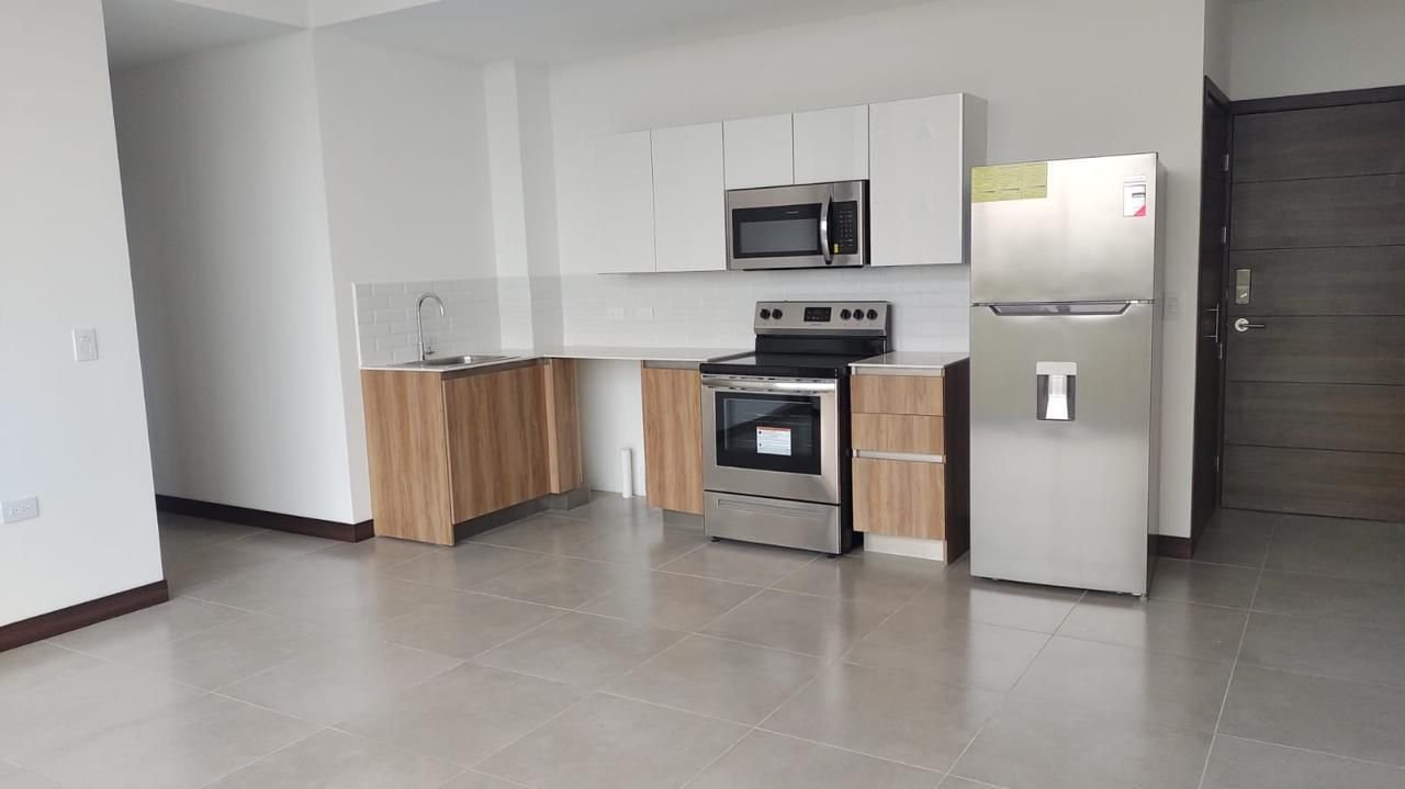 Apartamento con linea blanca y 2 habitaciones en renta en Z13